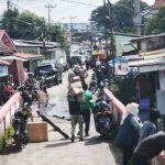 PEMKOT BANDARLAMPUNG BANTU DOKUMEN KEPENDUDUKAN WARGA HANYUT DAN RUSAK TERKENA BANJIR